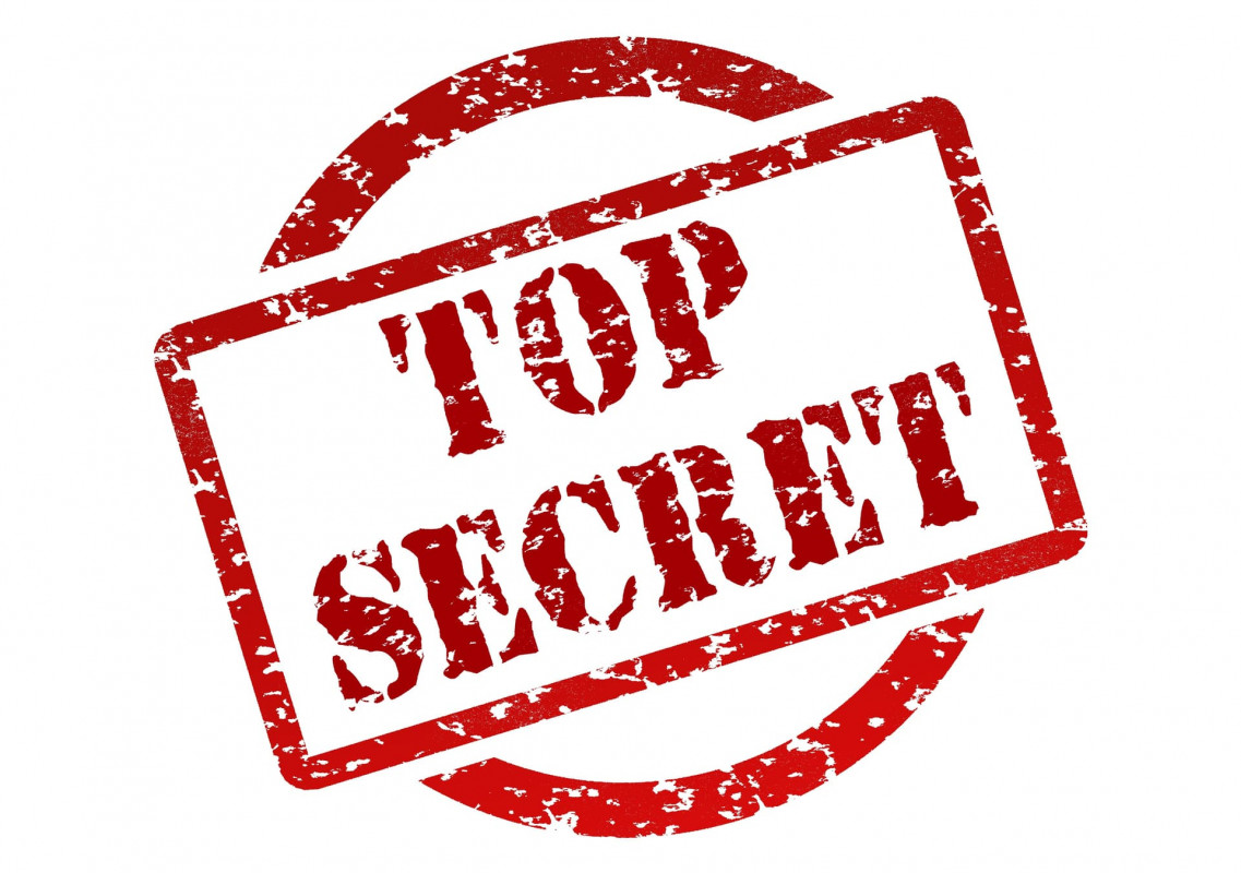 Red stamp saying top secret